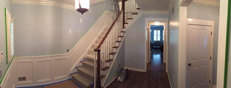 Interior hallway and staircase prepared for wall and trim painting