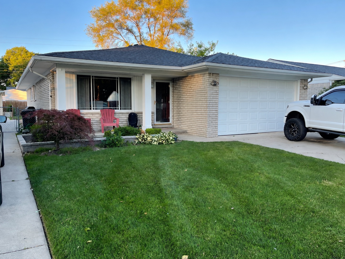 Brick exterior before a full-home exterior painting project